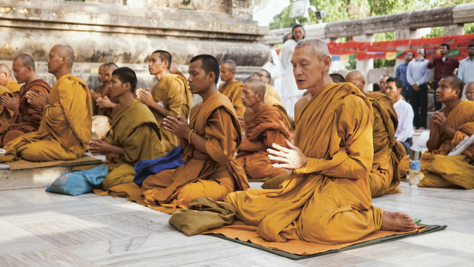 Monks at prayer in Mahabodhi Temple Complex