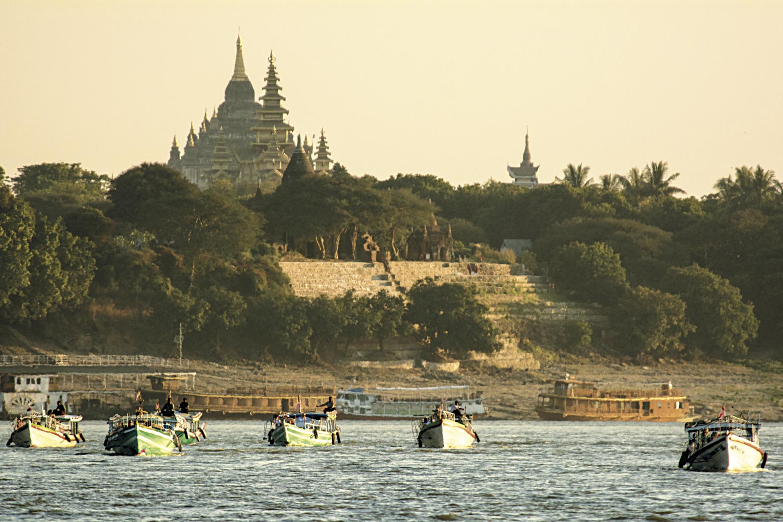 Boats sail on the Irrawaddy River along the Bagan, Myanmar
