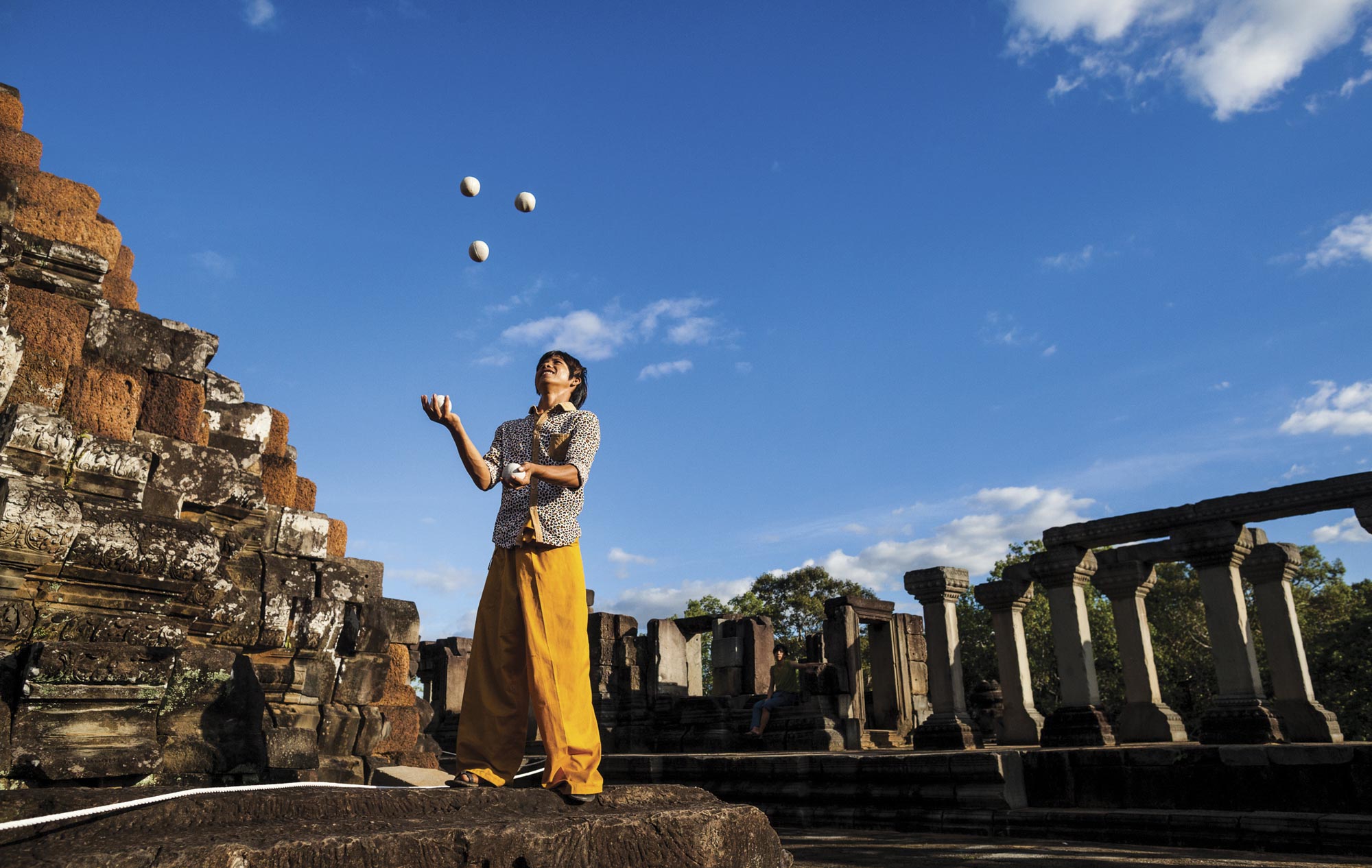 Viban juggling outside of the temples of Angkor Wat in Siem Reap