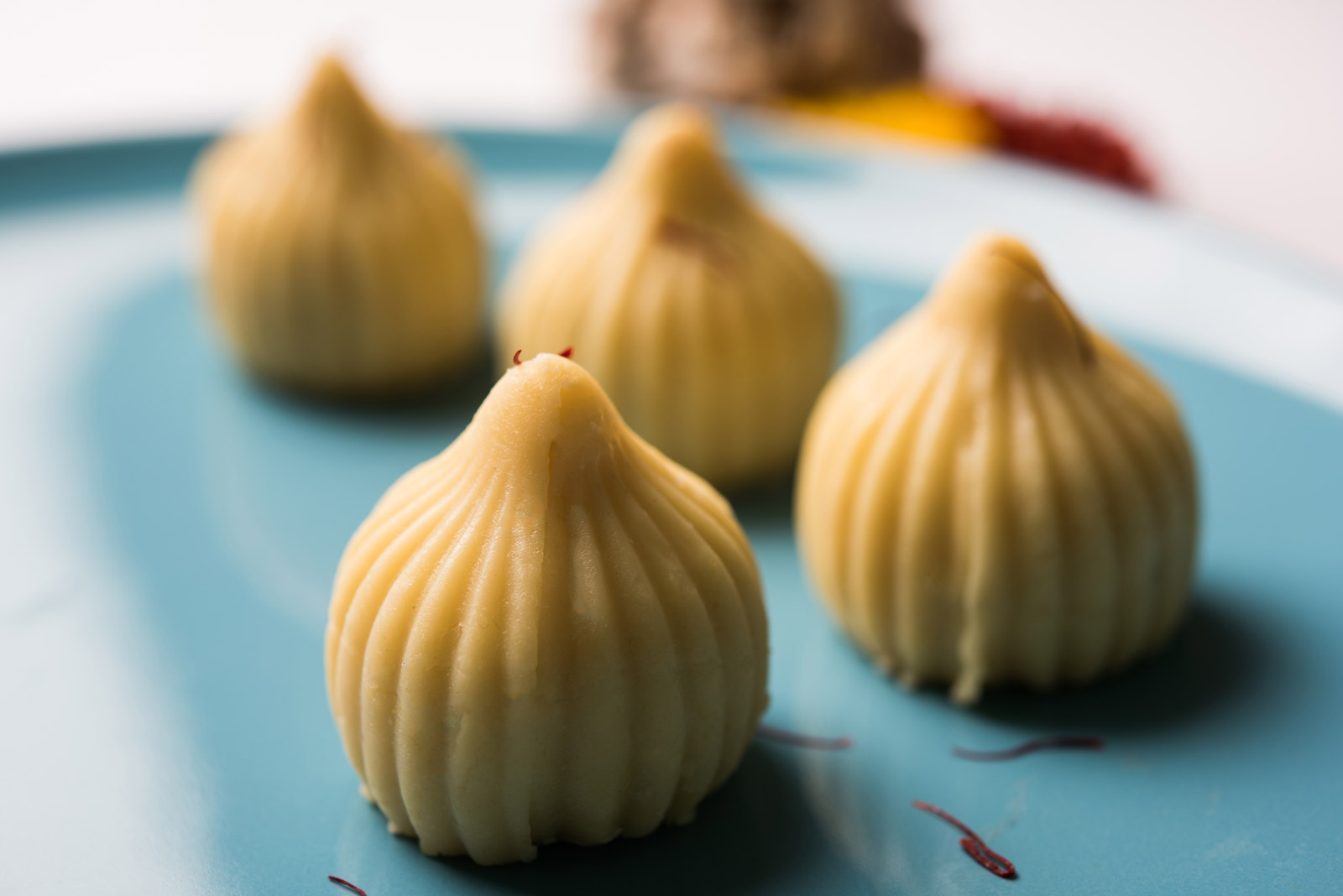 Modak traditional Indian sweet made with flour dumpling filled with freshly grated coconut and jaggery also for festivals and ceremonies