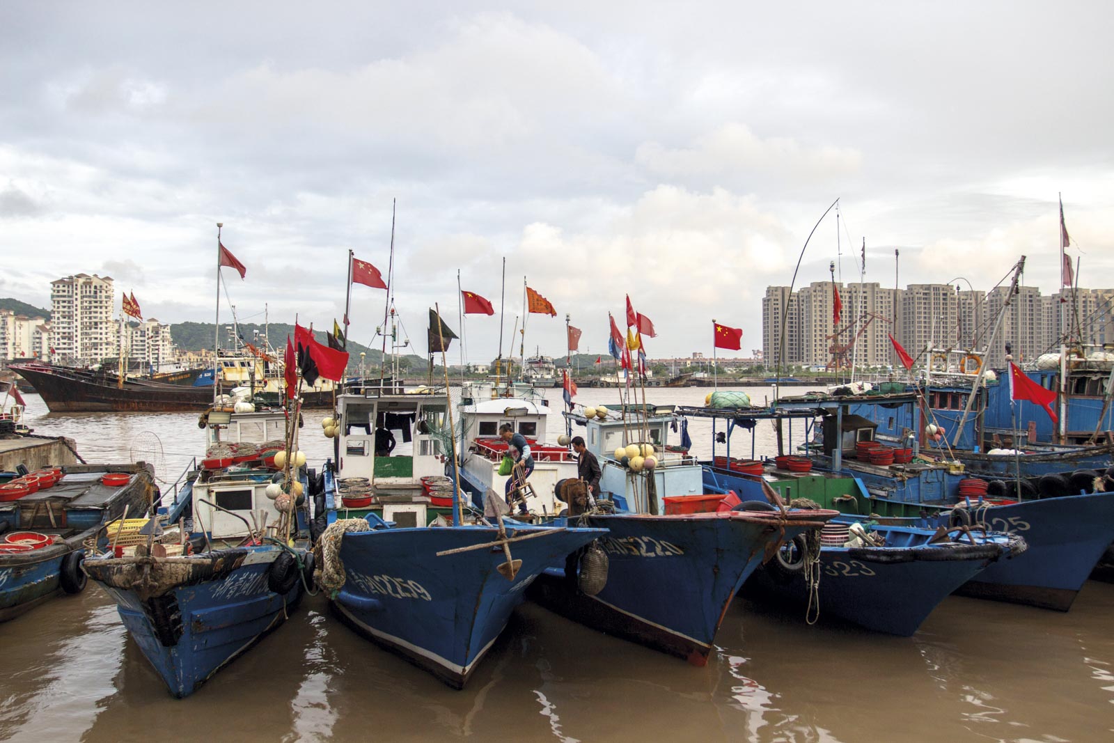 Fishing boats anchored in the port. From June.1, the
