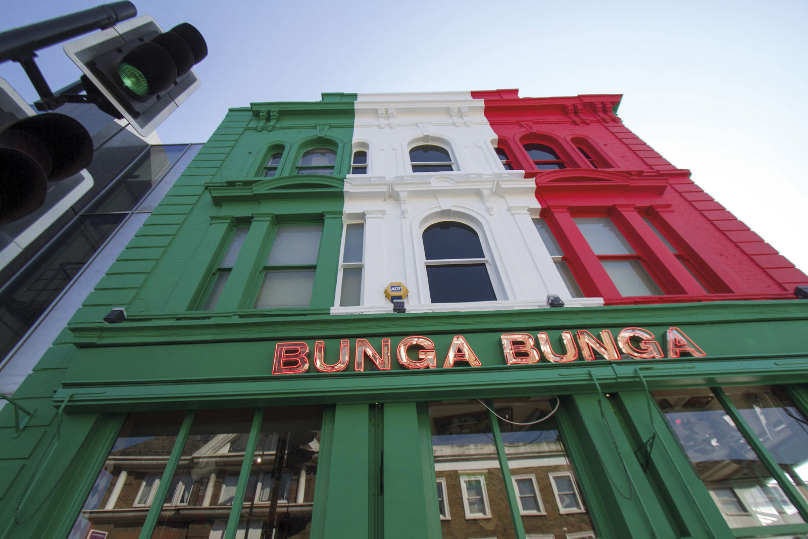 Battersea London,UK. 6th June 2016. The owners of Bunga Bunga an Italian themed bar in Battersea London have painted the building exterior with a bold red, white and green colour scheme the national colours of Italy for the 2016 European championship to