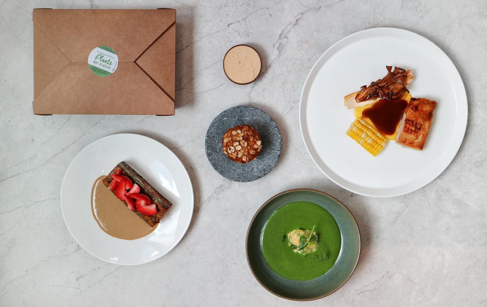 Simon Rogan at Home promotion from Roganic, featuring fresh pea soup with pike perch and pea salad, and staples like soda bread and roast pork shoulder