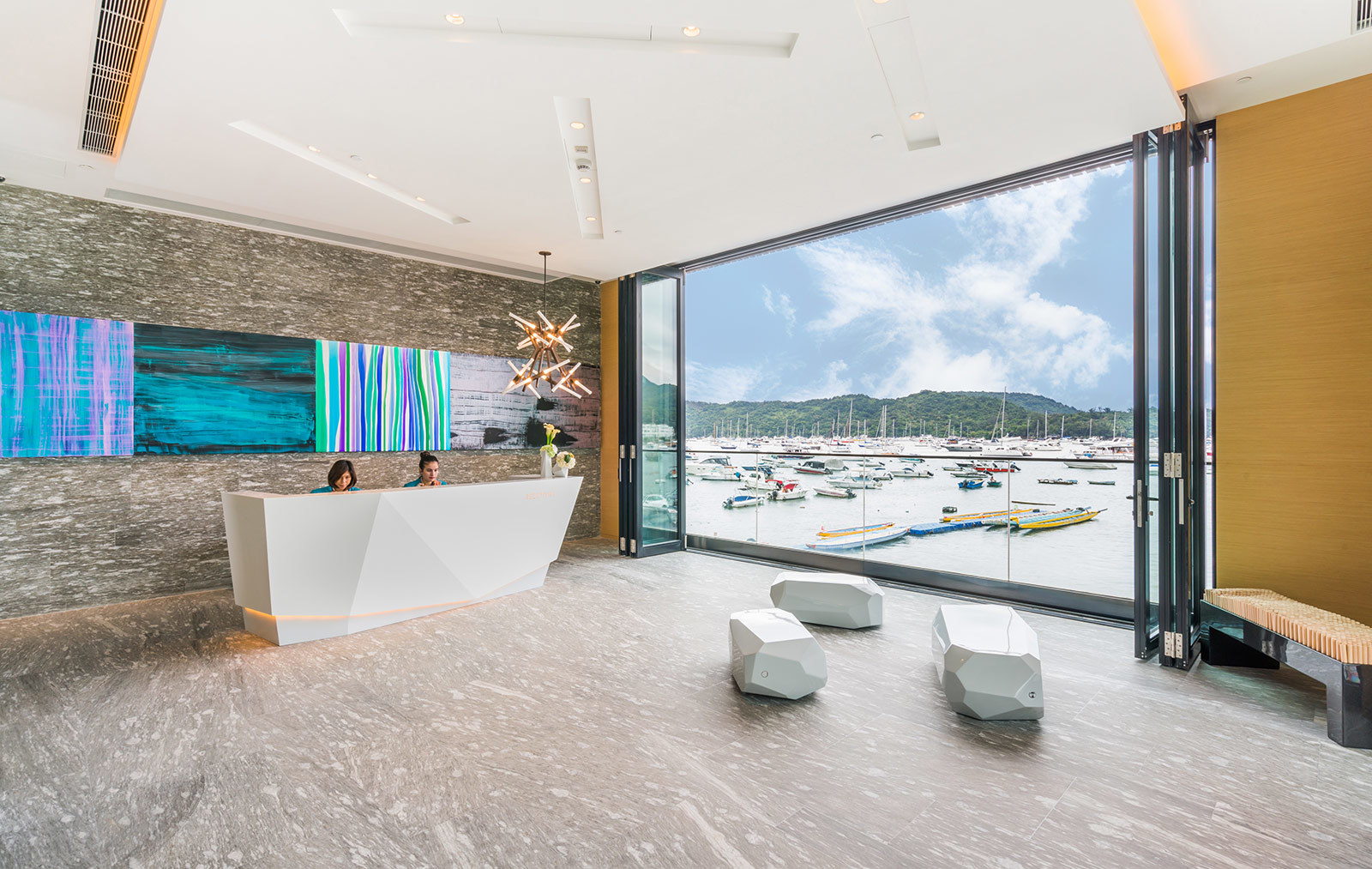 Lobby interior of The Pier Hotel with a view of the Sai Kung harbour in New Territories