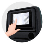 Hand touching an seatback inflight entertainment screen