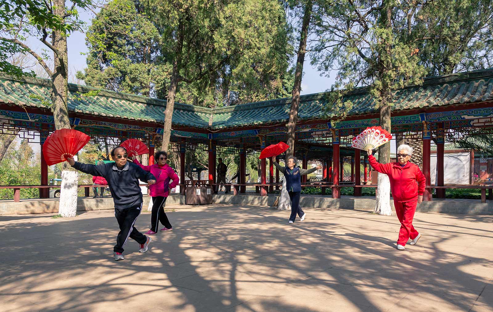 Locals playing tai chi in Kunming park