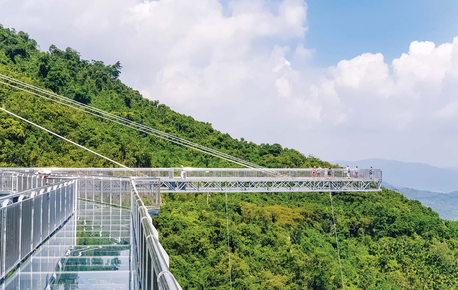 A pedestrian glass bridge in Yanoda Rainforest in Sanya, China