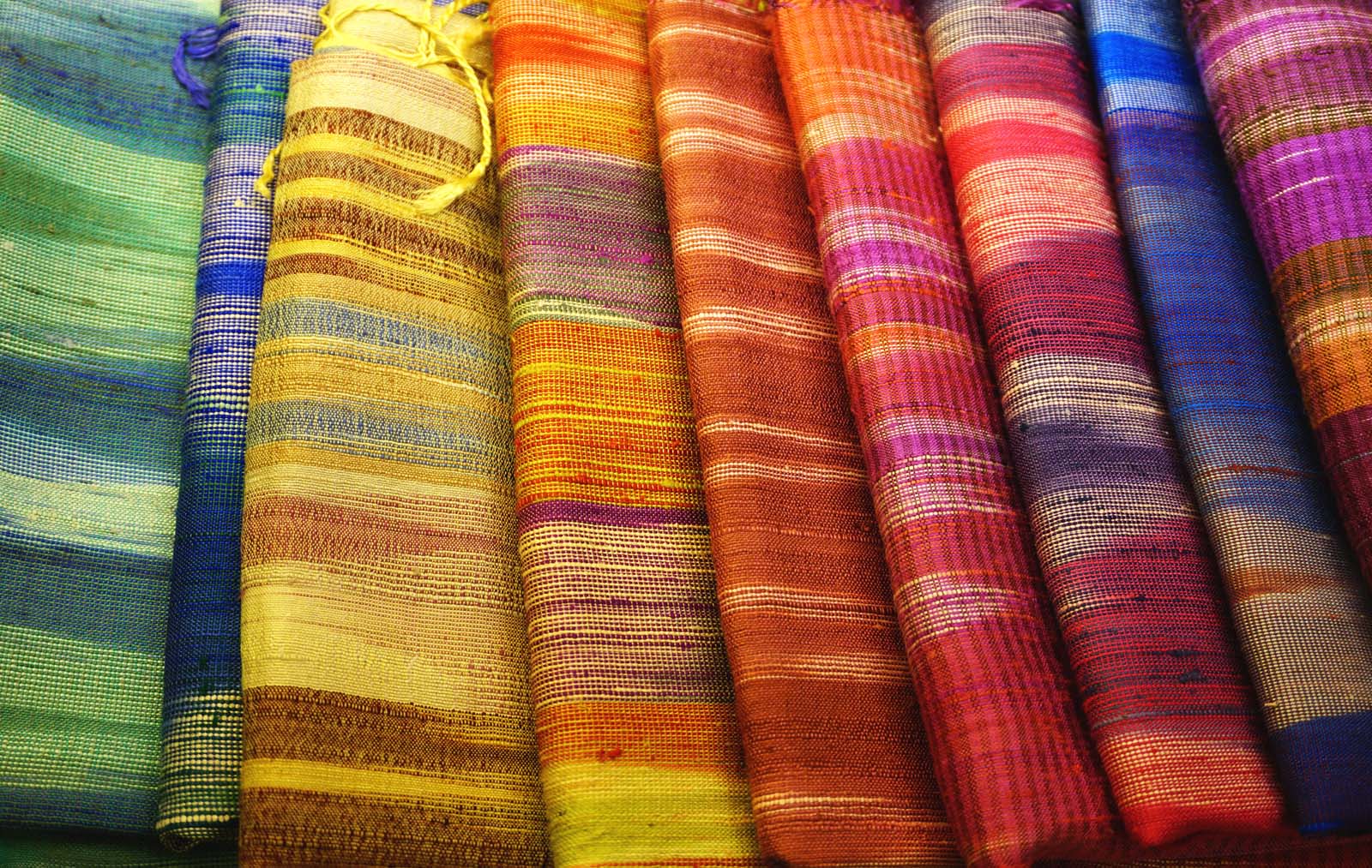 Brightly coloured Thai silk are often formed into stunning traditional costumes