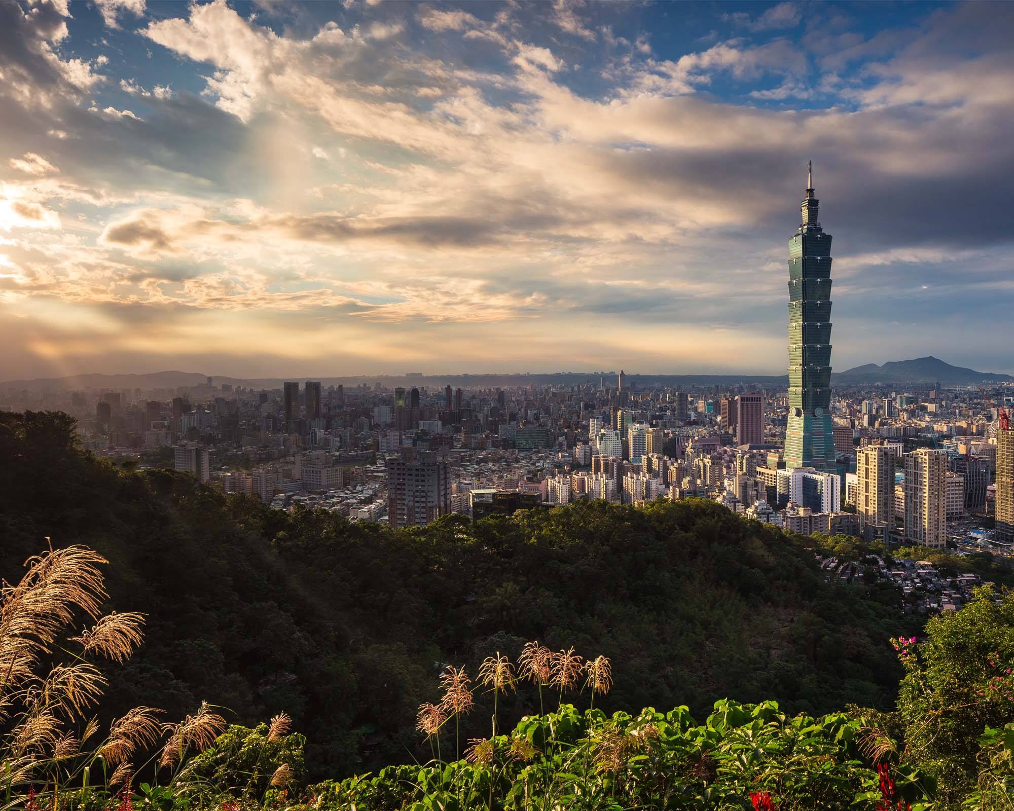 Overview of the Taipei skyline with dramatic sky and clouds