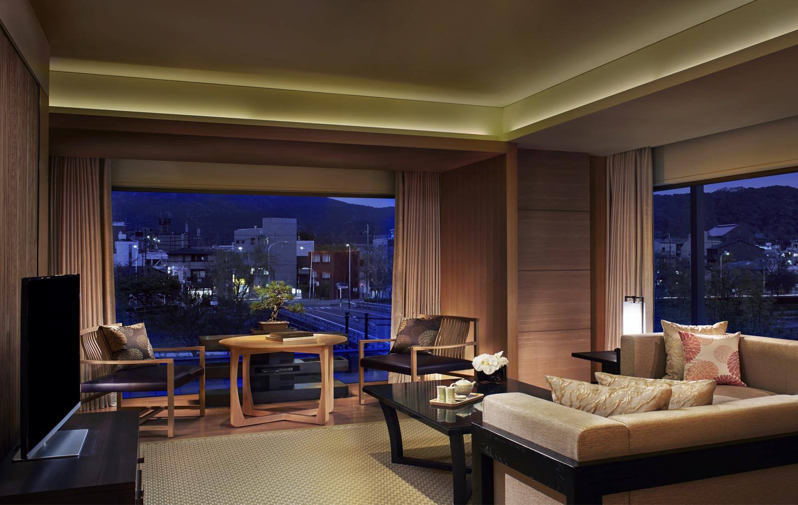Corner Suite Minami at The Ritz-Carlton, Kyoto offers splendid views of the Kamogawa River and historic Kyoto